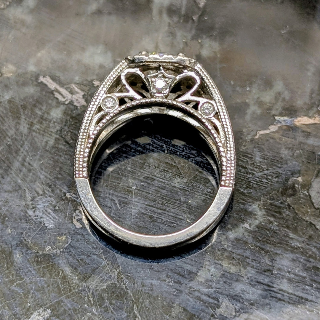 Platinum Antique Style Split-Shank Pave Diamond Ring with Halo Setting and Decorative Under-Gallery