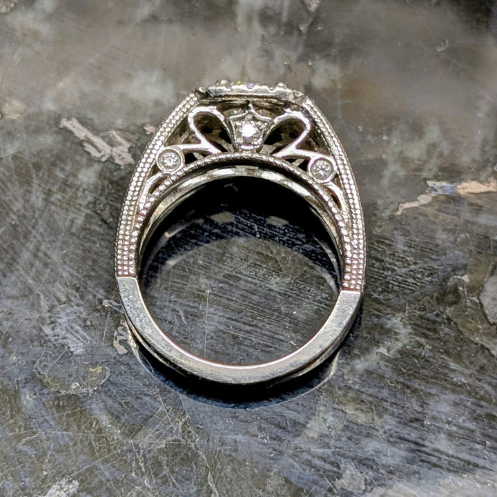 Platinum Antique Style Split-Shank Pave Diamond Ring with Halo Setting and Decorative Under-Gallery