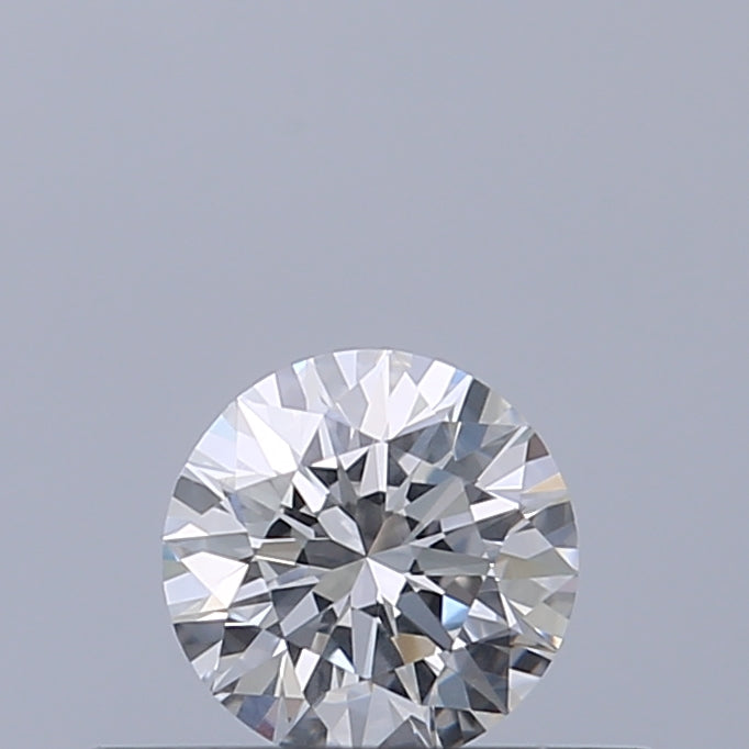 Round cut diamond on a light gray background